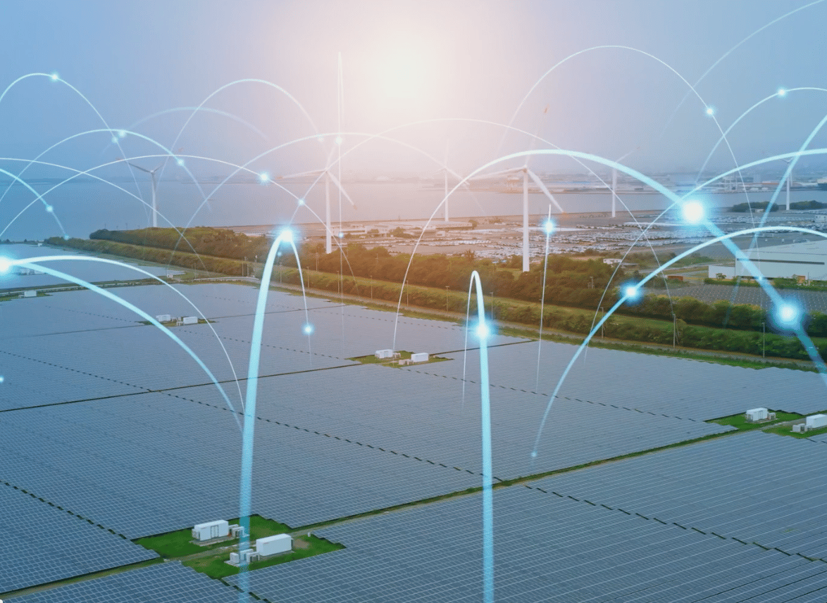 Overhead photograph of a solar energy field with arching light effects