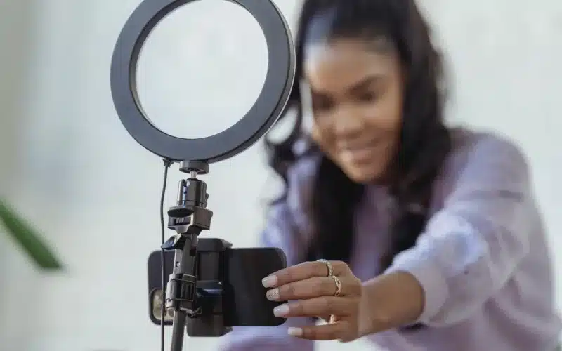 Woman setting up phone camera