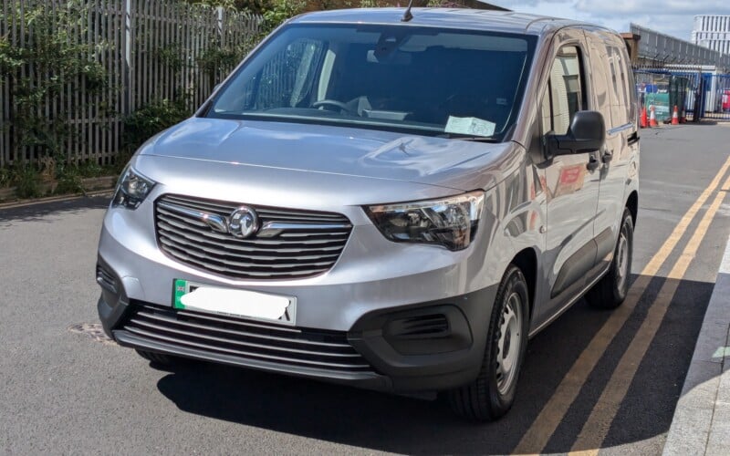 The front of a Vauxhall e-combo with the number plate whited out